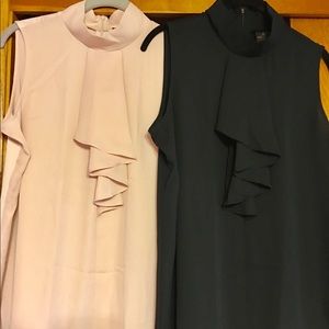 2 Tops, never worn Short sleeve Invisible zipper!